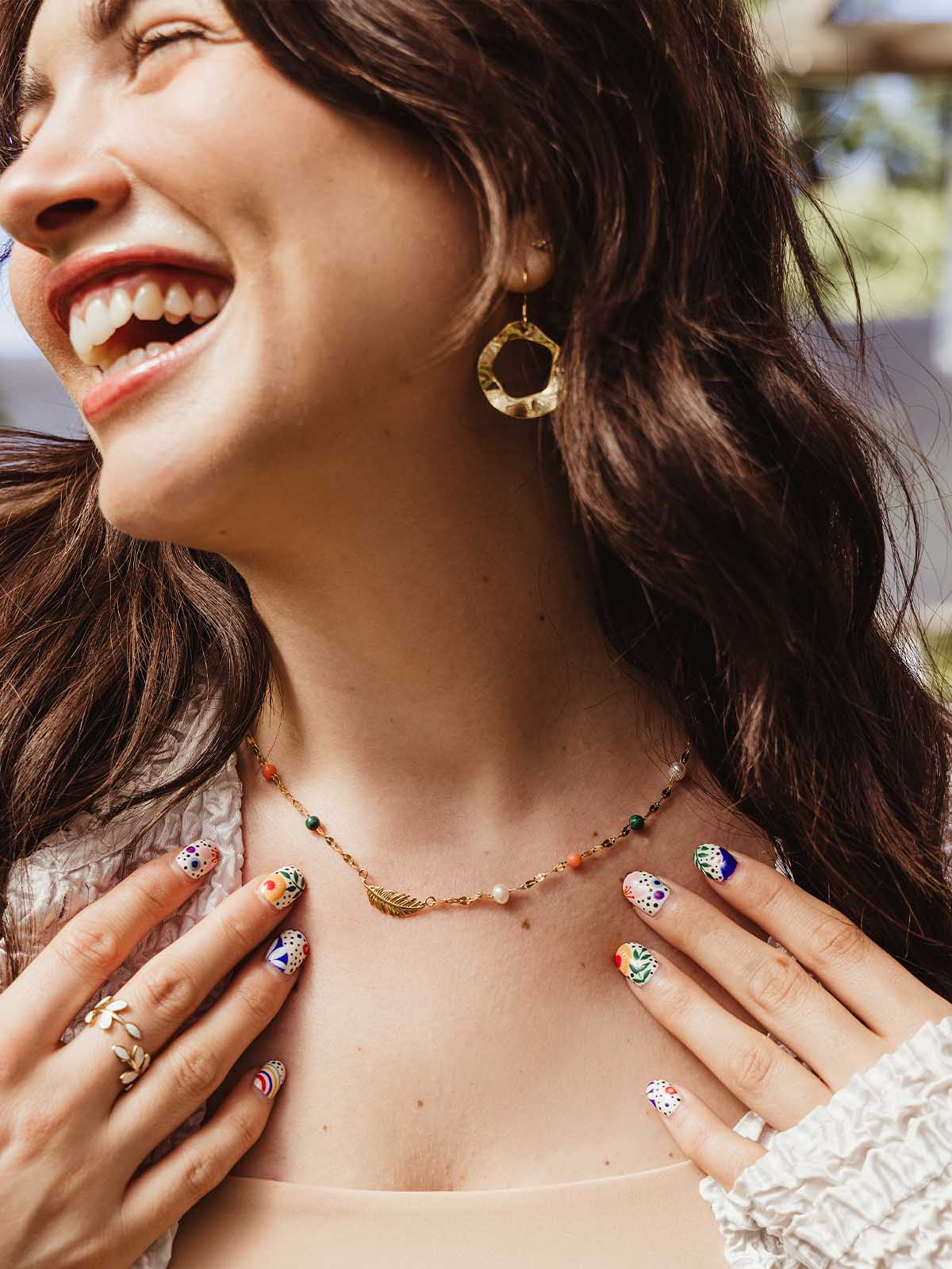 Song of Celebration Gold Feather Necklace