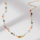 Song of Celebration Gold Feather Necklace