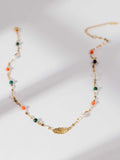 Song of Celebration Gold Feather Necklace
