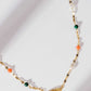 Song of Celebration Gold Feather Necklace