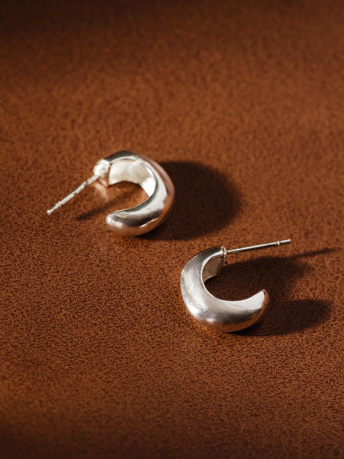 Silver Crescent Huggie Earrings