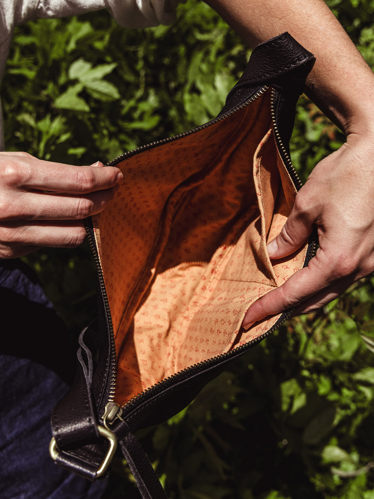 Black Leather Moon Sling Bag
