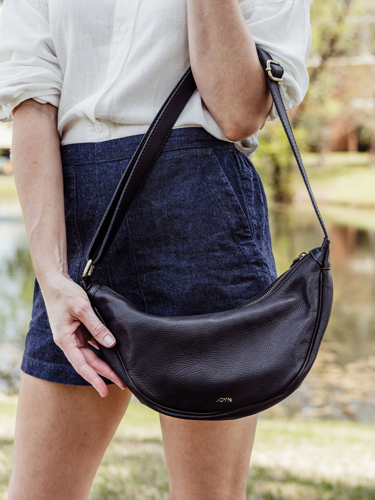 Black Leather Moon Sling Bag