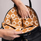 Pebbled Black Leather Half-Moon Backpack