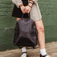 Pebbled Black Leather Half-Moon Backpack