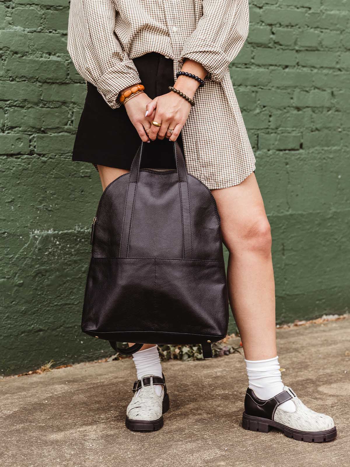 Pebbled Black Leather Half-Moon Backpack