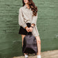 Pebbled Black Leather Half-Moon Backpack