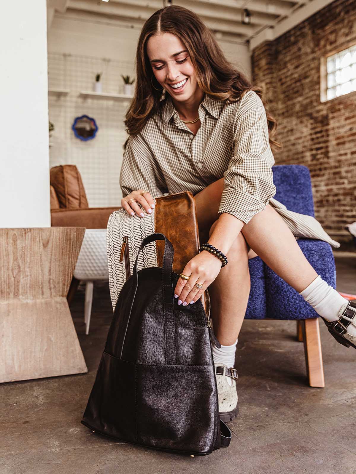 Pebbled Black Leather Half-Moon Backpack