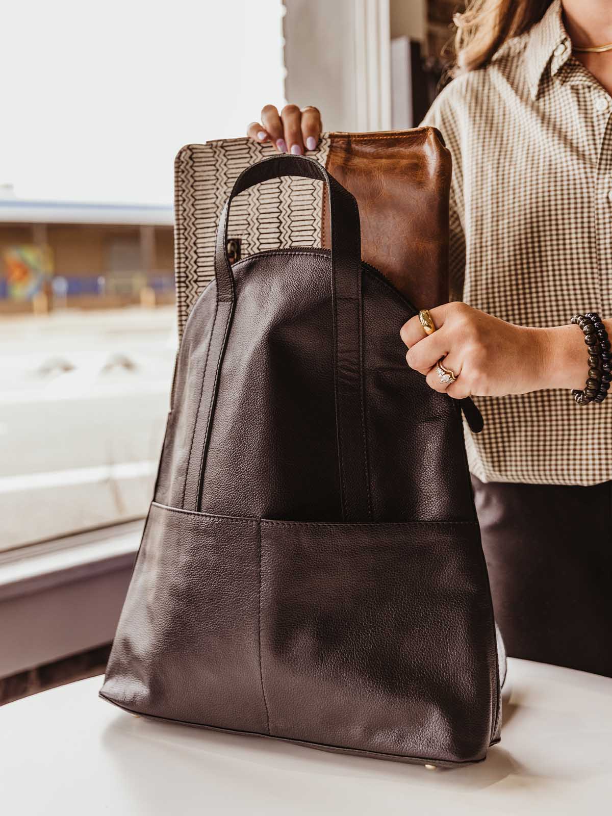 Pebbled Black Leather Half-Moon Backpack