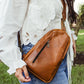 Sling Leather Crossbody Purse in Cognac